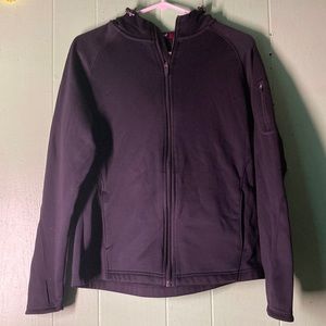 Woman, slim, fit sports jacket, zipper on sleeve and thumb holes, size medium